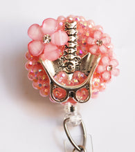 Load image into Gallery viewer, Orthopedic Spinal Beauty On Pink Retractable ID Badge Reel