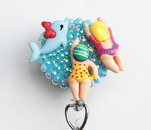 Load image into Gallery viewer, Swimming With A Pretty Dolphin Retractable ID Badge Reel